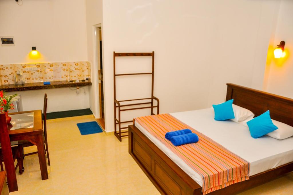Postel nebo postele na pokoji v ubytování Hiru Resort Inn
