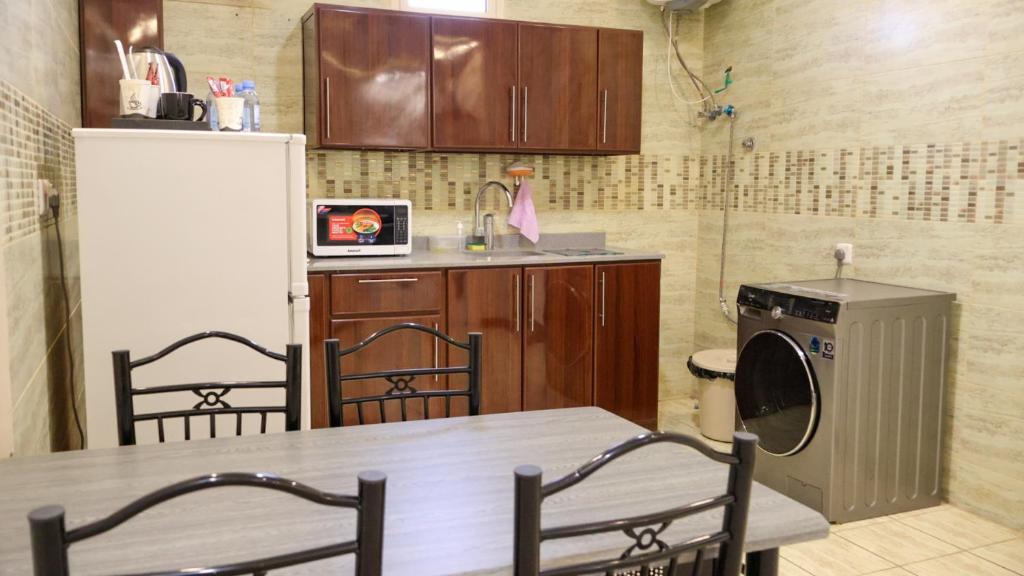 Kuchyň nebo kuchyňský kout v ubytování Tamyoz Aparthotel 2