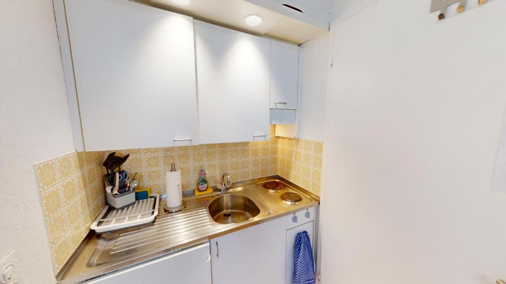Kuchyň nebo kuchyňský kout v ubytování Zentral Altstadt Chur - Bahnhofsnah - Ferienwohnung - Bernina Express - Solution-Grischun