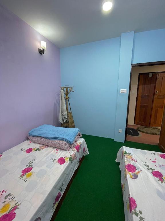 Postel nebo postele na pokoji v ubytování Raniban Serenity Suite