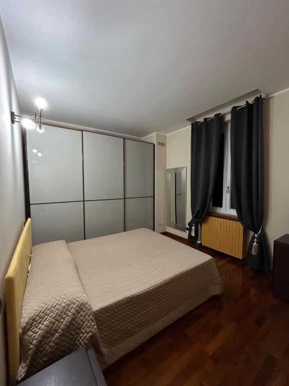 Postel nebo postele na pokoji v ubytování B&B Licia Home