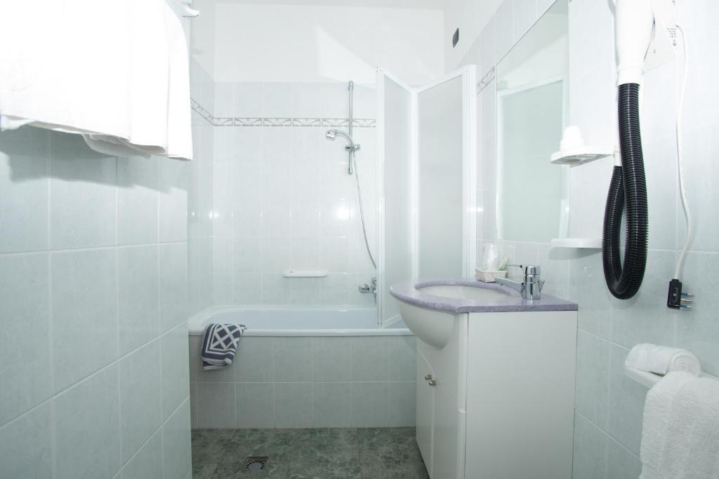 Koupelna v ubytování Hotel Pigna D'Oro