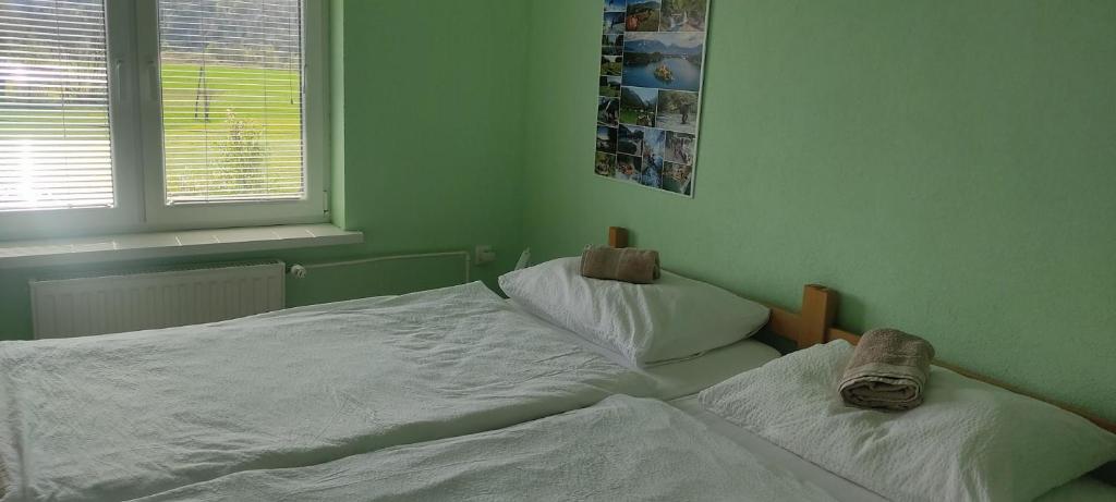 Postel nebo postele na pokoji v ubytování Hacienda Bled Rooms