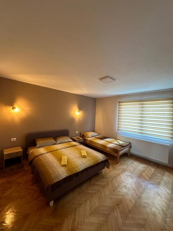 Postel nebo postele na pokoji v ubytování Apartman Pogled Arilje