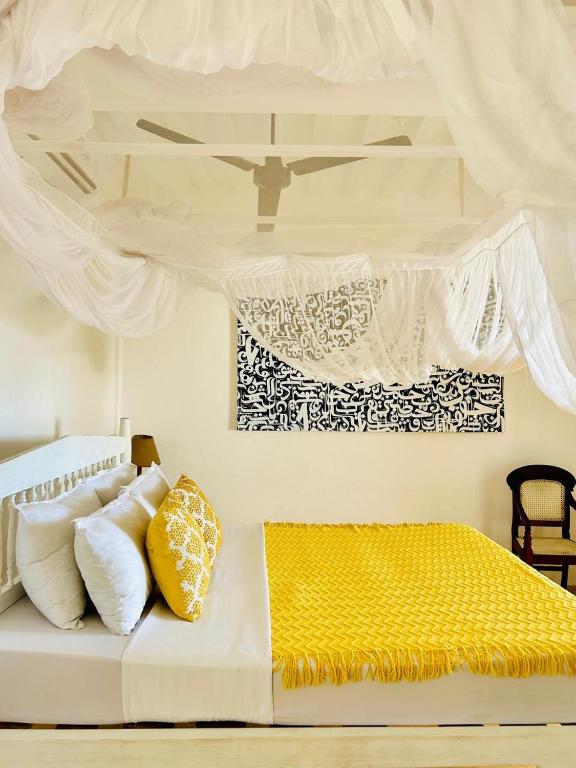 Letto o letti in una camera di Shela Bahari