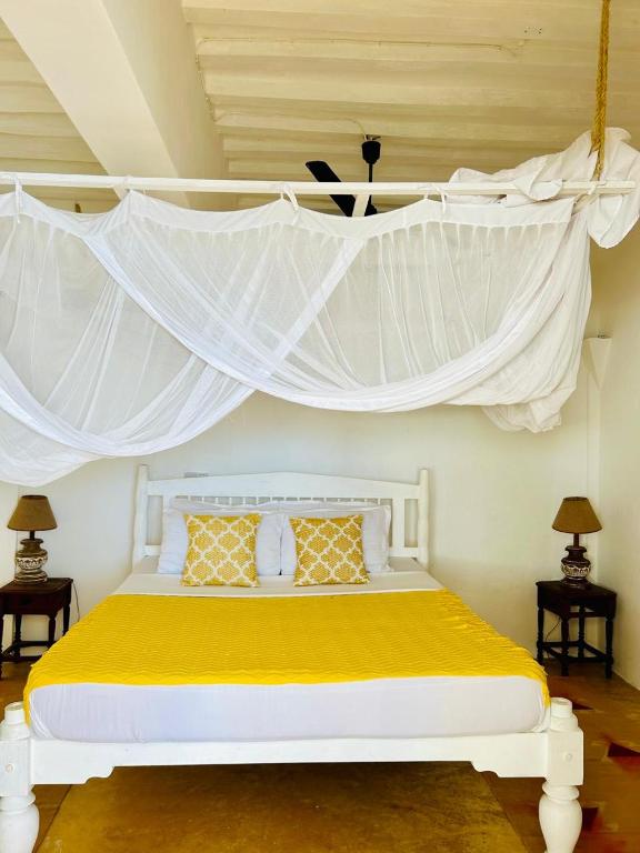 Letto o letti in una camera di Shela Bahari
