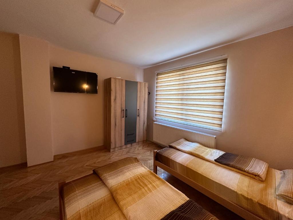 TV a/nebo společenská místnost v ubytování Apartman Pogled Arilje