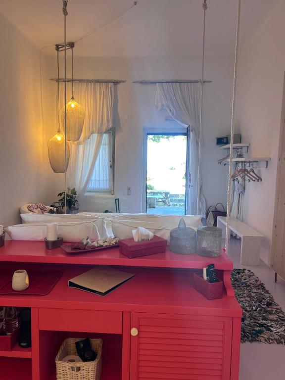 Kuchyň nebo kuchyňský kout v ubytování Aigis Suites Kea