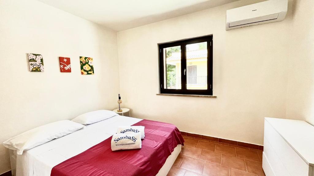 Postel nebo postele na pokoji v ubytování SambaSS Apartment