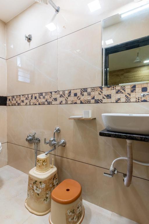 Koupelna v ubytování Hotel Noble Inn, Ahmedabad