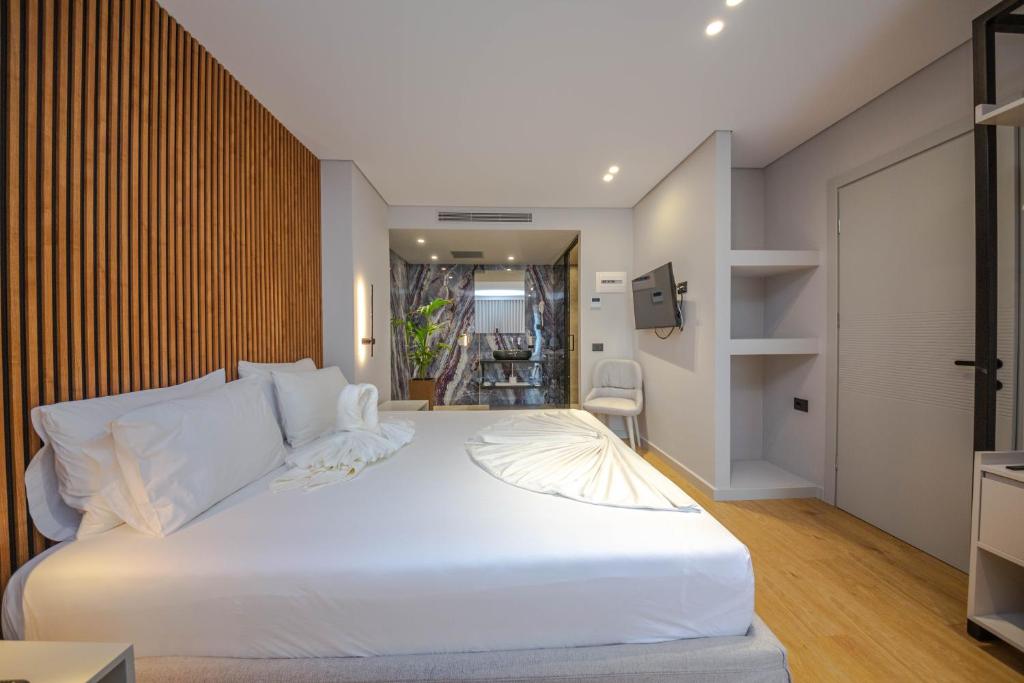 Postel nebo postele na pokoji v ubytování Hotel Sole Mare