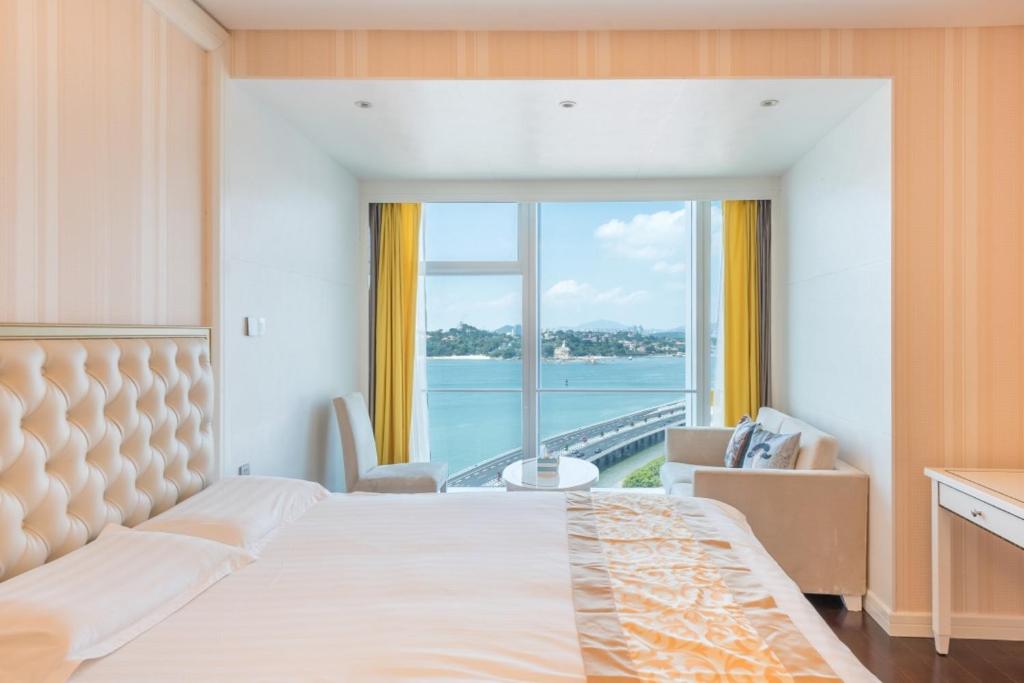 Postel nebo postele na pokoji v ubytování Xiamen Ocean View Suite - Xiamen University Twin Towers Branch