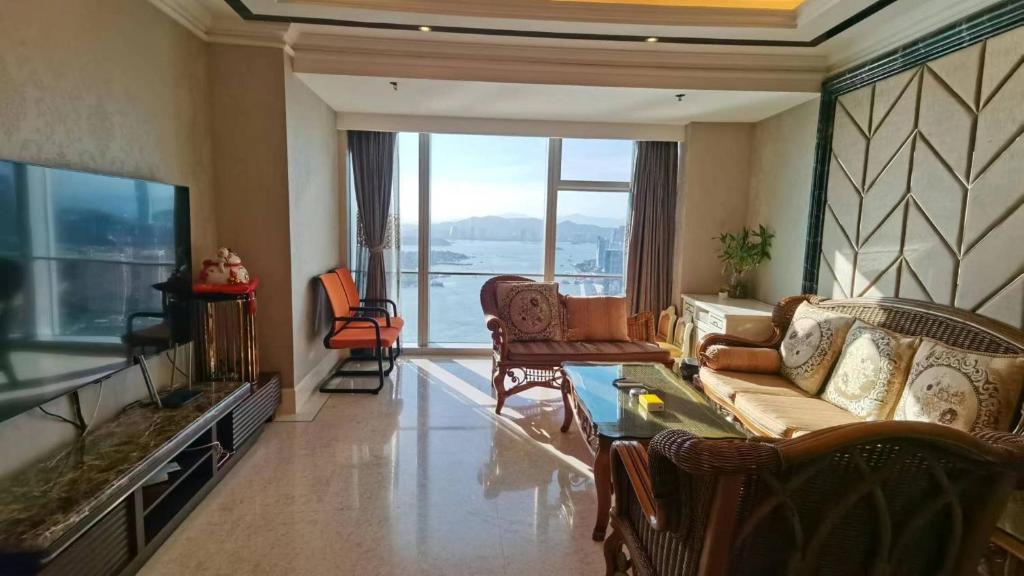 TV a/nebo společenská místnost v ubytování Xiamen Ocean View Suite - Xiamen University Twin Towers Branch