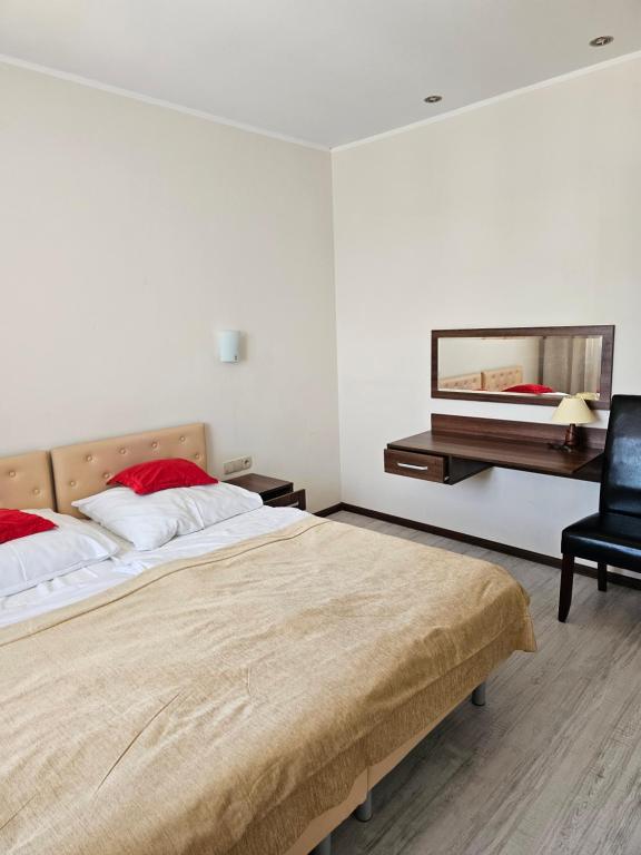Postel nebo postele na pokoji v ubytování Dom Wczasowy Korona