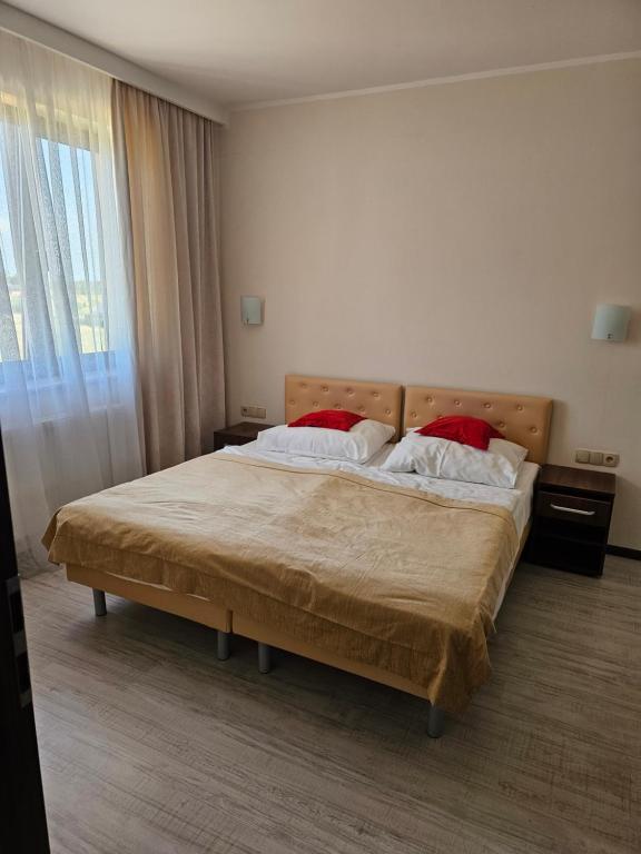 Postel nebo postele na pokoji v ubytování Dom Wczasowy Korona