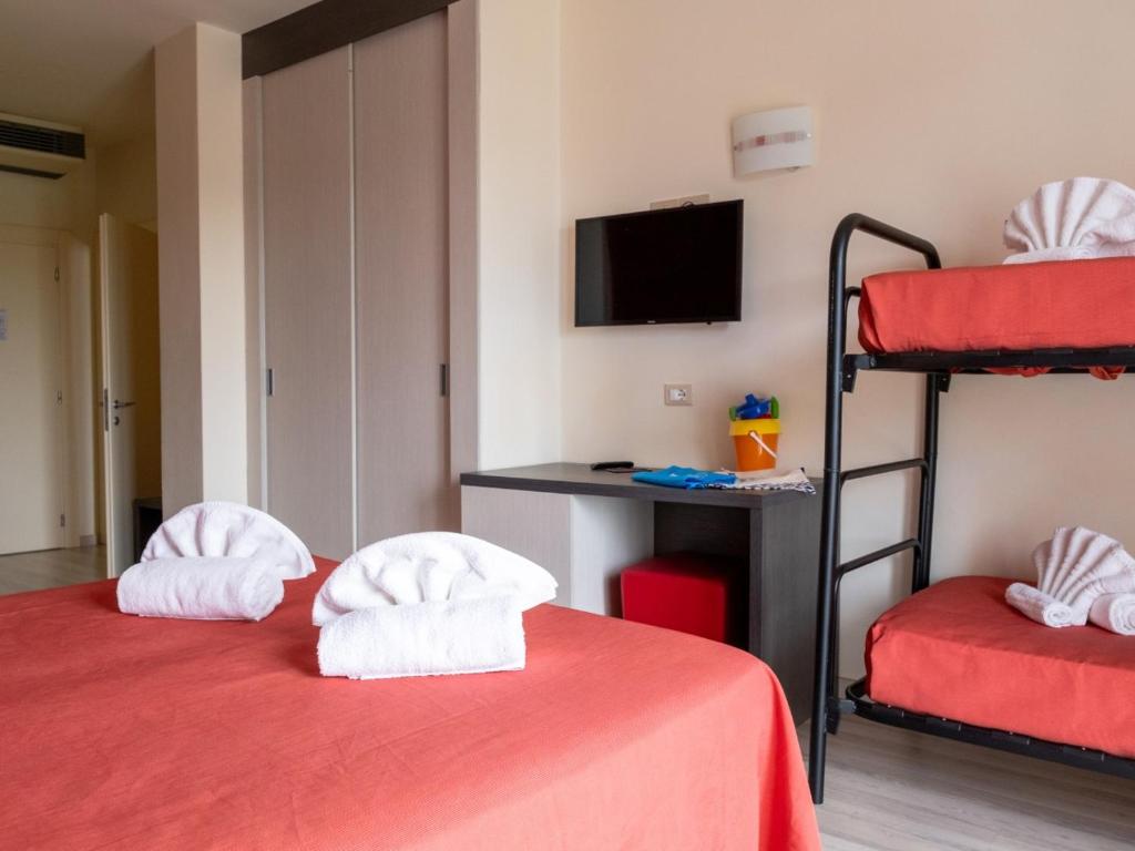 Postel nebo postele na pokoji v ubytování Family Hotel Alexander - Azzurro Club