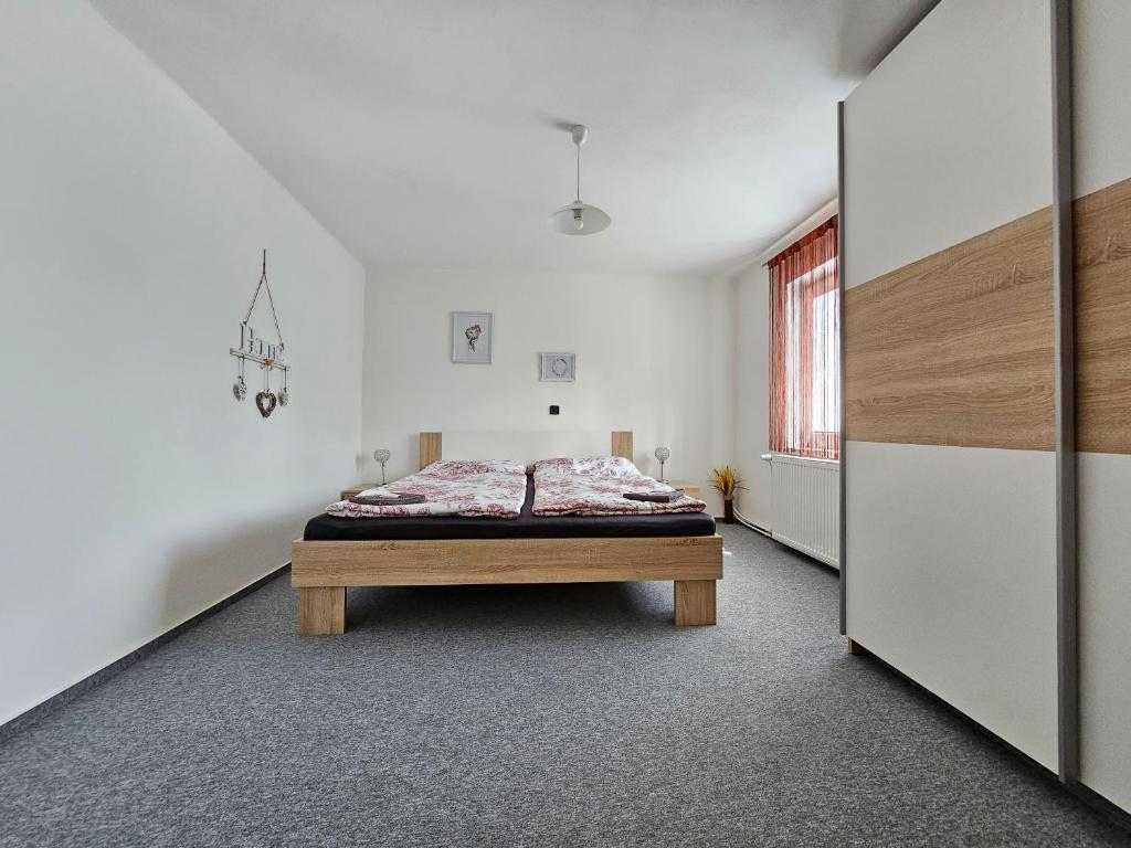 Postel nebo postele na pokoji v ubytování Chalupa u Rádlů