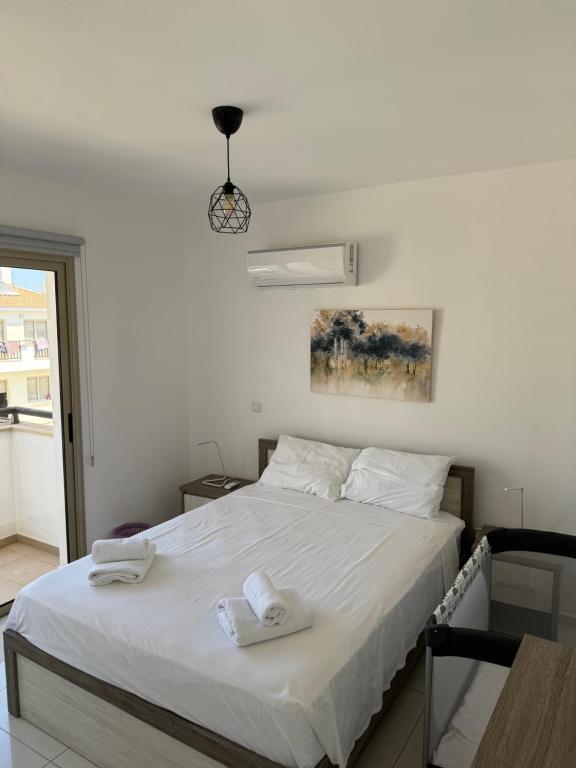 Postel nebo postele na pokoji v ubytování Villa Naxos