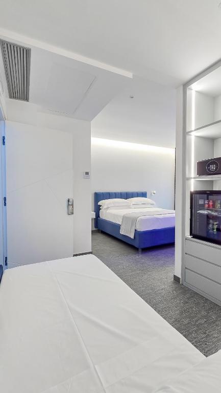 Postel nebo postele na pokoji v ubytování Papavero Giallo B&B