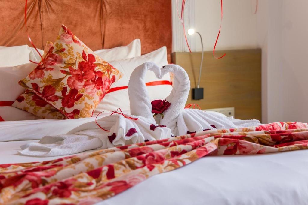Postel nebo postele na pokoji v ubytování Mandarin Palace Hotel & Spa
