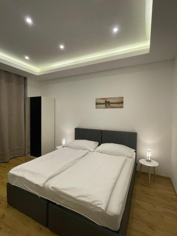 Postel nebo postele na pokoji v ubytování Haydnsuite