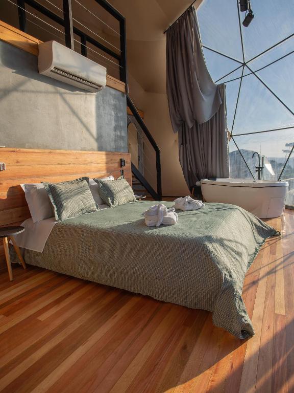 Voodi või voodid majutusasutuse Orion Glamping Hospedagem Domo Geodésico em Urubici toas