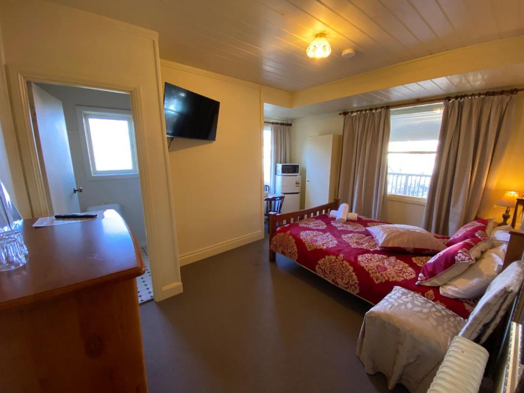 Letto o letti in una camera di Ellstanmor Guesthouse Cooma