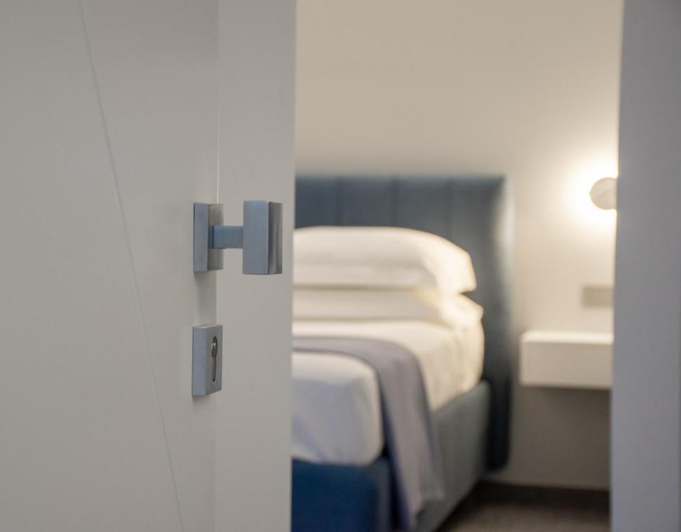 Postel nebo postele na pokoji v ubytování Papavero Giallo B&B