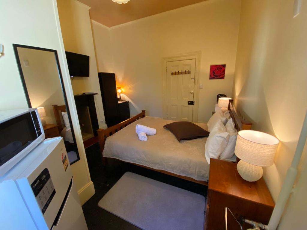 Letto o letti in una camera di Ellstanmor Guesthouse Cooma