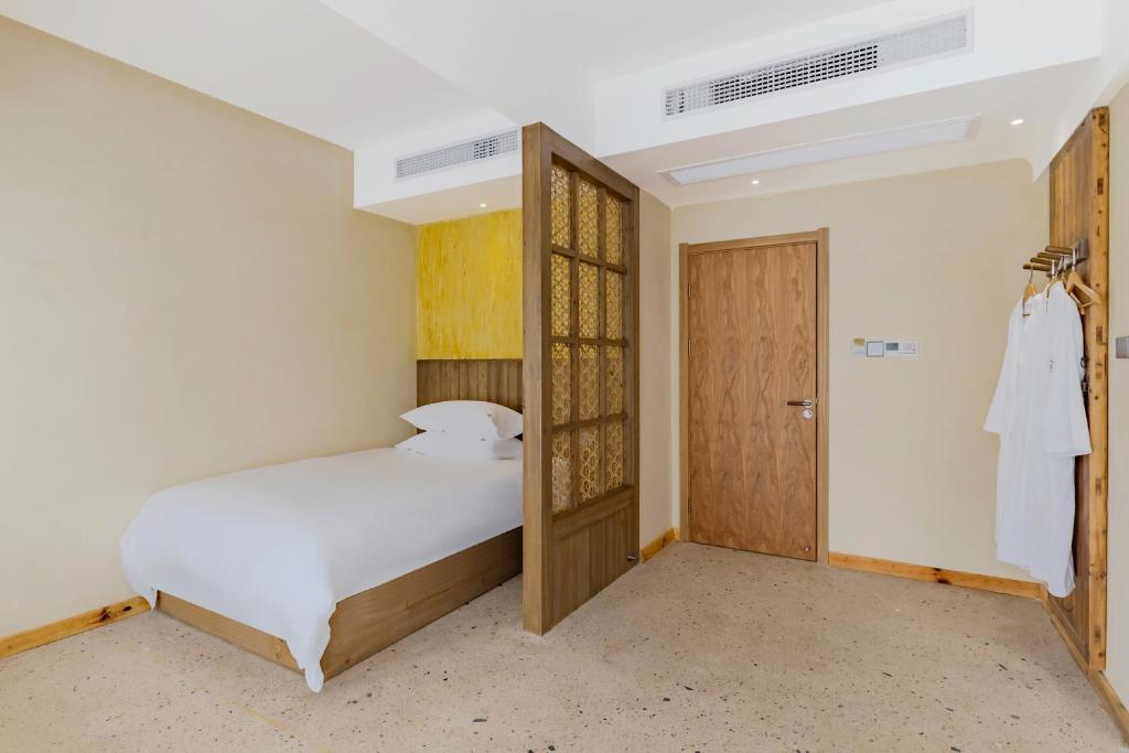 Letto o letti in una camera di 问安民宿（黄山风景区店）