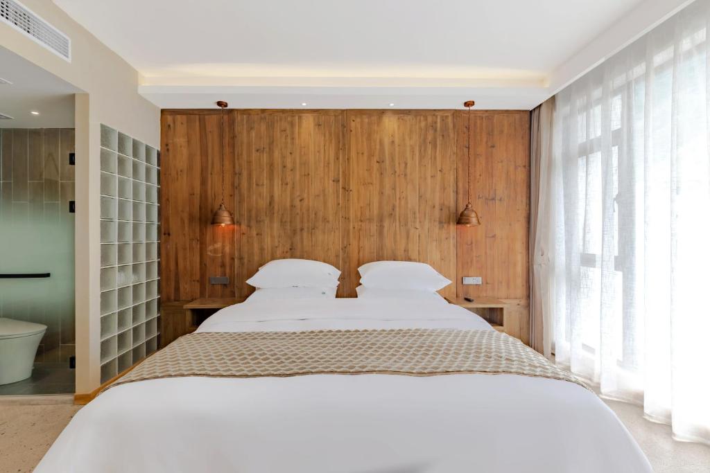 Letto o letti in una camera di 问安民宿（黄山风景区店）