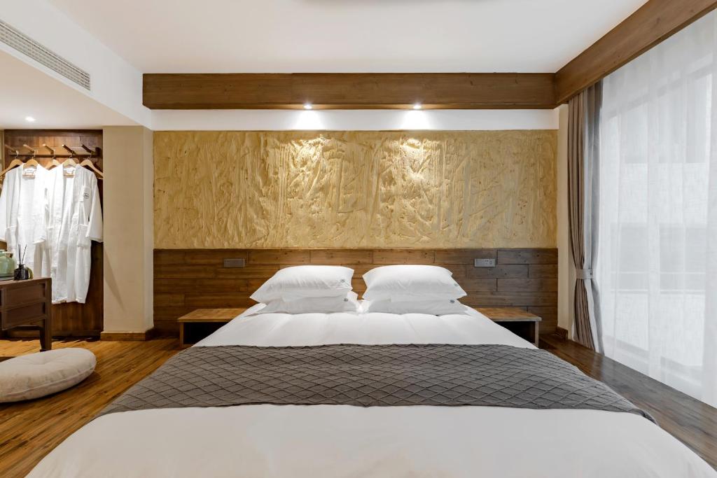 Letto o letti in una camera di 问安民宿（黄山风景区店）