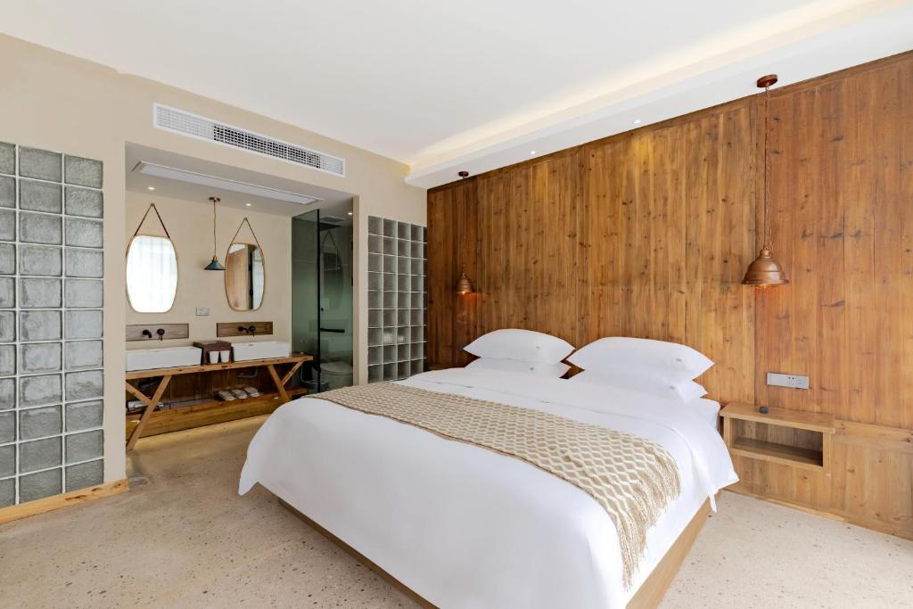 Letto o letti in una camera di 问安民宿（黄山风景区店）