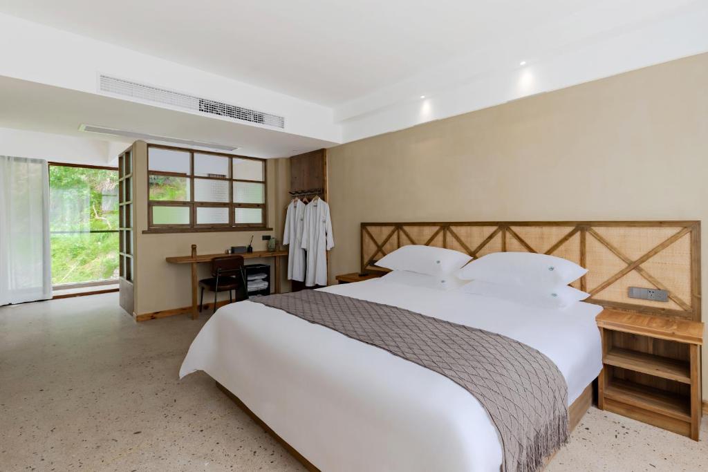Letto o letti in una camera di 问安民宿（黄山风景区店）