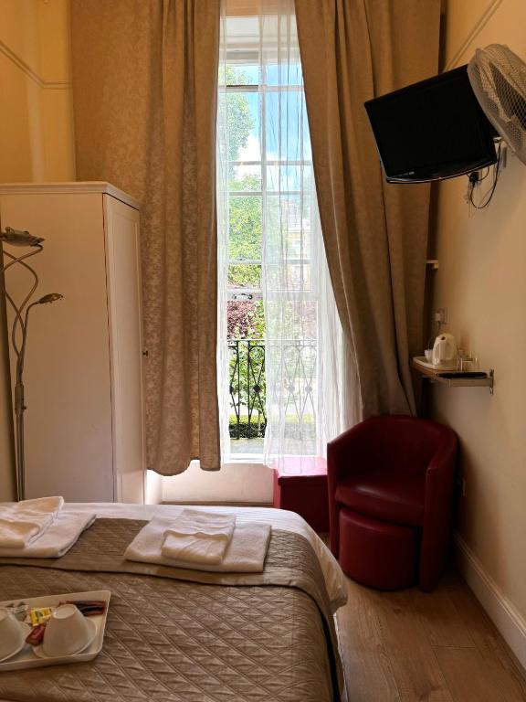 Postel nebo postele na pokoji v ubytování ABC Hyde Park Hotel