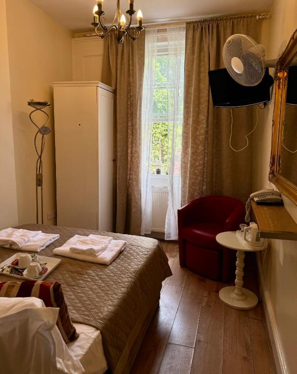 Postel nebo postele na pokoji v ubytování ABC Hyde Park Hotel