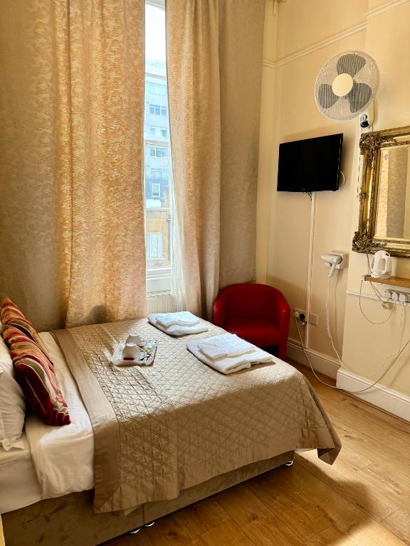 Postel nebo postele na pokoji v ubytování ABC Hyde Park Hotel