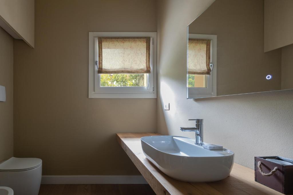 Koupelna v ubytování Luce Boutique Hotel