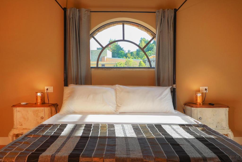 Postel nebo postele na pokoji v ubytování Luce Boutique Hotel