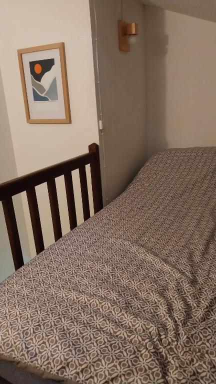 Postel nebo postele na pokoji v ubytování Petit chalet dans résidence