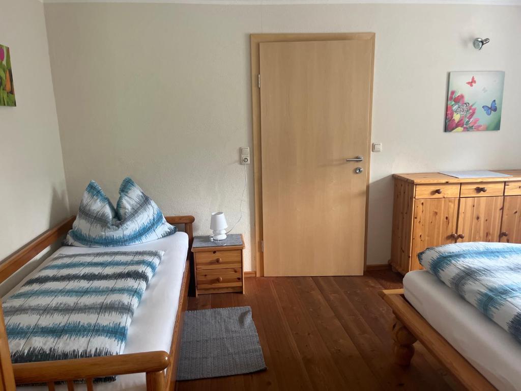 A bed or beds in a room at Landhaus Ganzer