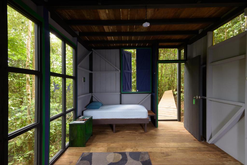 Postel nebo postele na pokoji v ubytování Yatama Rainforest Ecolodge