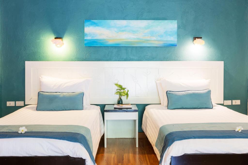 Postel nebo postele na pokoji v ubytování Vacation Village Phra Nang Inn - SHA Extra Plus