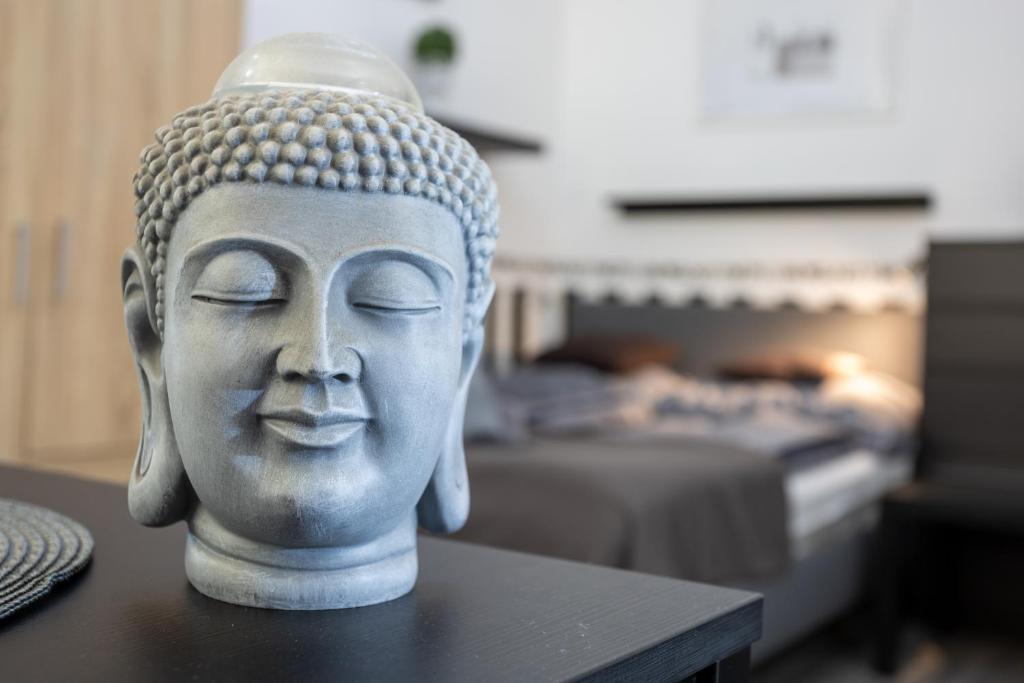 Posteľ alebo postele v izbe v ubytovaní Gecko Centrum Studio Apartman