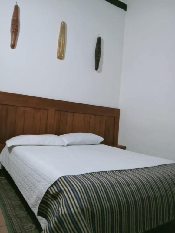 Postel nebo postele na pokoji v ubytování Villa Candelaria Hostel