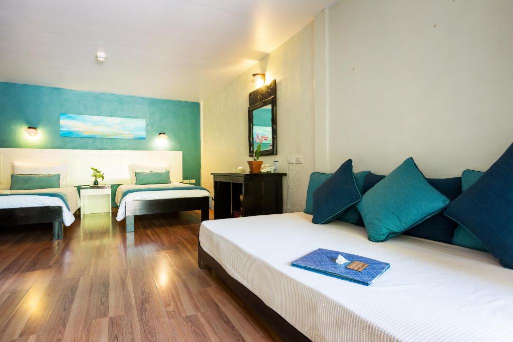 Postel nebo postele na pokoji v ubytování Vacation Village Phra Nang Inn - SHA Extra Plus