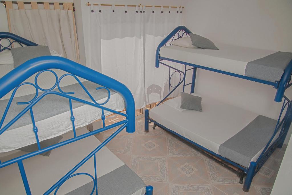 Postel nebo postele na pokoji v ubytování Casa María - Hotel Boutique