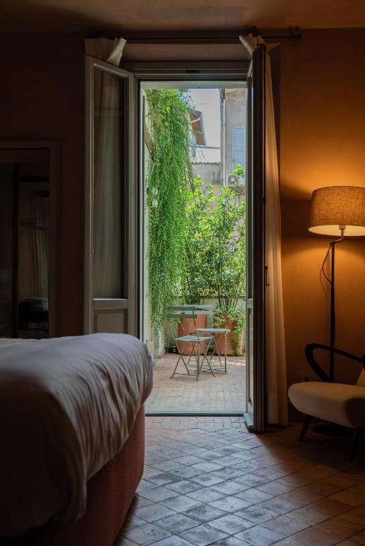 Łóżko lub łóżka w pokoju w obiekcie Locanda La Concia