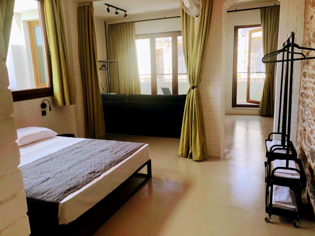 Ένα ή περισσότερα κρεβάτια σε δωμάτιο στο Loft in Aplotaria