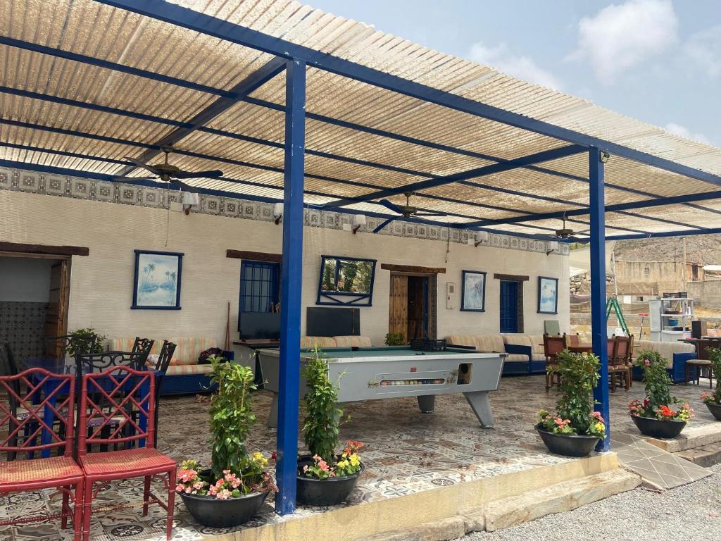 a pavilion with a pool table in a patio at Bonitas vistas al mar in Almería